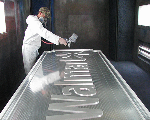 Sign Production Facility - Sign Spraying
